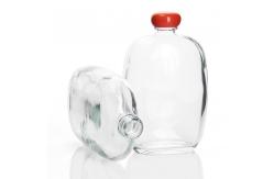 China Custom 50ml 200ml Small Glass Juice Bottles Flat With Screw Lid supplier