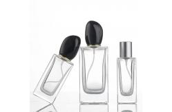 China Square Glass Perfume Bottle with 50ml 100ml Capacity and Distinctive Irregular-shaped Cap supplier