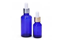 China 1oz 2oz  Clear Glass Bottle Essential Oil Bottles With Golden Dropper supplier