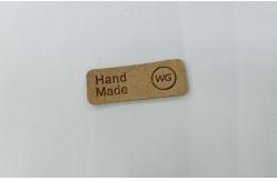 China Embossed Logo Microfiber PU Leather Patches Washable Labels Sew On Clothing supplier