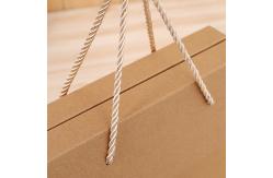 China Custom Packaging Recycled Kraft Paper Box With Rope Handle Environmental and Packing Items supplier