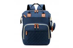 China Multi Function Mommy Diaper Backpack With Changing Bed Infant Baby Diaper Bag supplier