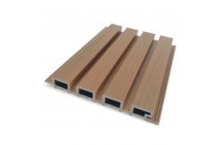 China Outdoor Capped Composite Solid Fluted WPC Panel Board Coextruded Cladding supplier