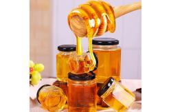 China 730ml Polygon Hexagon Glass Storage Bottles Embossed For Chili Sauce Pickle supplier