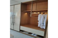 China Clothing store display rack stainless steel drawing mirror titanium  gold clothes and hats hanging display shelf supplier