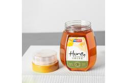 China 0.7L Plastic Honey Bottles Reflux Inlet Sealing Jars Hot Stamping supplier