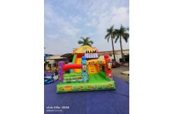 China Fun Park Dry Inflatable Bouncy Slides With Candy Shop Theme supplier