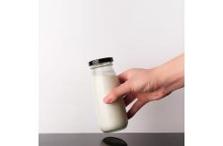 China 200Ml 250Ml 500Ml Transparent Clear Iced Drinks Milk Glass Bottles With Lid supplier