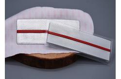 China TPU Two Colour Debossed Logo Heat Transfer Labels For Garments supplier