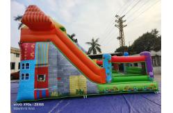China Fun Park Dry Inflatable Bouncy Slides With Candy Shop Theme supplier