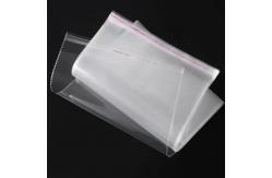 China Custom Clothing Opp Header Bag With Clear Hang Hole And Personalized Printing supplier