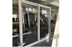China Thermal Break Alumimum Sliding Glass Door Manual Roller Shutter Double Tempered Glass supplier