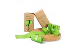 China Biodegradable Compostable Roll Dog Poop Bags with Custom Gravure Printed Logo supplier