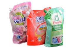 China Liquid Premade Pouch Packing Machine Rotary With Paste Filler supplier