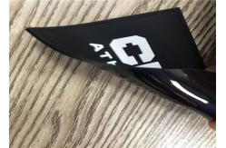 China Embossed White Character With Black Background Soft PVC Patches With Sewing Line supplier