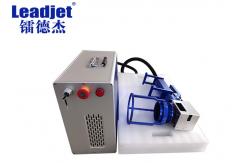 China Mini Handheld Fiber Laser Batch Coding Machine Compact Design For Rubber Pipe supplier