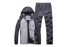 China Durable Grey Sports Team Uniforms Elastic Ribbed Waistline With Detachable Hat supplier
