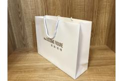 China 250gsm Recycled ODM White Paper Shopping Bags With Handles supplier