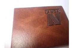 China Custom Leather Label Design Clothing Embossed Leather Patches For Garment supplier