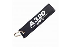 China Custom A320 Aircraft Keychain – Double-Stitched Polyester Fabric + Rust-Free Metal Hardware supplier