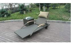 China Modern Rattan Sun Lounger , Folding Lounger With Side Tea Table supplier