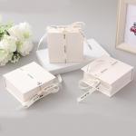 White Ribbon Logo Foldable Gift Box Make Up Clothes Accessories Rigid Paperboard With Glossy Lamination for sale
