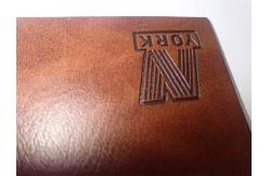 China Custom Leather Label Design Clothing Embossed Leather Patches For Garment supplier