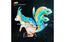 China Giant Illuminated Squirrel Sculpture Lantern With Dazzling Peacock Feather Tail supplier