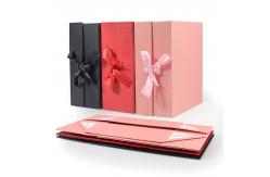 China Recycled Paper Ribbon Tie Magnetic Gift Boxes With Matte Finish Packaging Boxes supplier