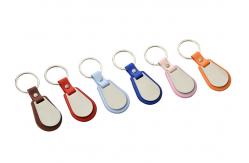 China Debossed Logo PU Leather Keychain Keyring Edge Coating Metal Key Holder supplier