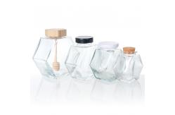 China Empty 100Ml 380Ml Hexagonal Honey Pot Glass Honey Jar With Dipper supplier