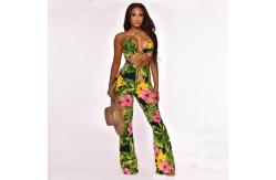 China Printed One Piece Deep V Jumpsuits Bandage Flare Backless Jumpsuit supplier