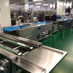 Multiple lanes horizontal pan arranging machine