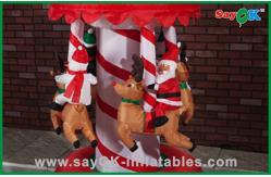 China Funny Christmas Carousel Inflatable Holiday Decorations Air Blown Inflatables supplier