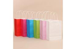 China Custom Logo Printing Reusable Kraft Paper Gift Packaging Bag With Handle supplier