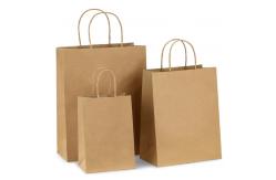 China Custom Logo Brown Kraft Paper Bags Reusable Kraft Packaging Bag With Handles supplier