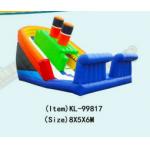 Orange And Green Inflatable Slides With White Sliding Surface
