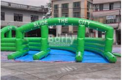 China Crazy Fun Green Inflatable City Slide Big Inflatable Slides For Street / Road supplier