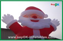 China Custom Red Inflatable Christmas Santa Claus With Bread Inflatable Cartoon Character supplier