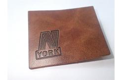 China Custom Leather Label Design Clothing Embossed Leather Patches For Garment supplier