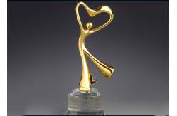 China Elegant Design Standing Metal Trophy Cup Gold Plated For Dancing Winners supplier