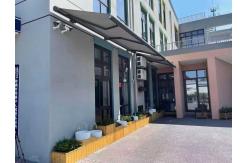 China Outdoor Sunshade Motorized Lightweight Retractable Awning With LED Lights Garden Canopy supplier