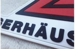 China Red And White Embossed Silicon Badges Customized Soft Rubber Logos PVC Patches supplier