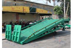 China 10T-10M Customized Green Loading And Unloading Goods Hydraulic Dock Ramp supplier