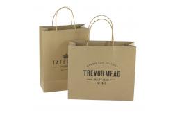 China Cardboard Packaging Brown Craft Shopping Paper Bag With Handles supplier