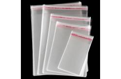 China Custom Clothing Opp Header Bag With Clear Hang Hole And Personalized Printing supplier