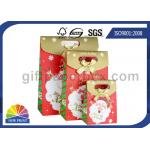 Customized Christmas Gift Packaging Bag with Die Cut Handles Ribbon Bowknot for sale