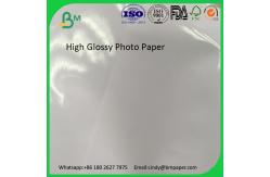 China Waterproof Cheap Cast Coated A4 Glossy Inkjet Photo Paper supplier