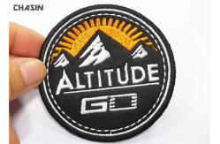 China Twill Material Baseball Hat Embroidery Round Patches With Glue Backing supplier