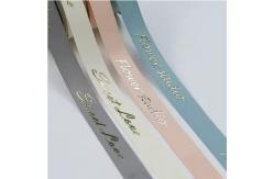 China Customized Grey Shiny 3D Foil Printing Polyester Grosgrain Ribbon for Gift Packaging supplier